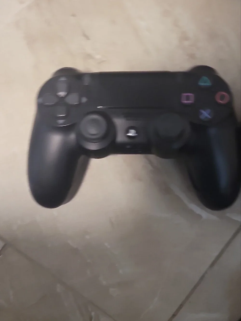 Sony Black PS4 Slim Console with Two Black DualShock Controllers